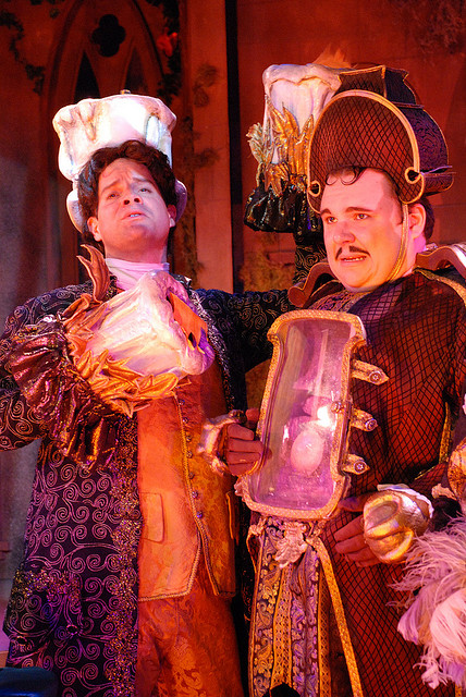 two men in costume for a theater production of beauty and the beast
