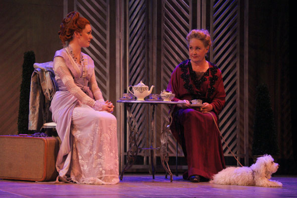 two women performing a scene from my fair lady on stage