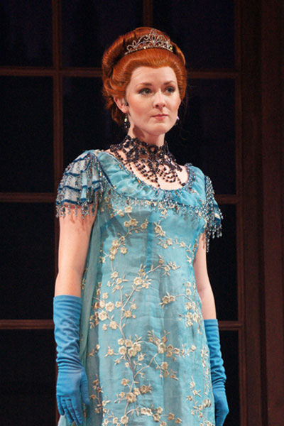 an actress in a blue dress